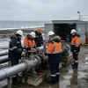 Leapy hi vis workwear solution for SOCAR oilfield workers inspecting pipeline valves in cold coastal conditions