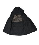 Interior view of the Leapy waterproof padded jacket revealing the metallic graphene liner panel and diamond-quilted insulation, designed to reflect body heat and provide superior warmth for cold-weather hiking.