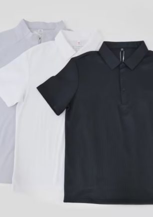 Leapy polo shirt fabric guide displaying black, white, and light grey short-sleeve options with textured knit finish for versatile corporate uniform sourcing