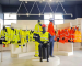 Leapy showroom displaying hi-vis safety vests and workwear on racks and mannequins.
